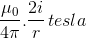\frac{\mu _{0}}{4\pi }.\frac{2i}{r}\, tesla